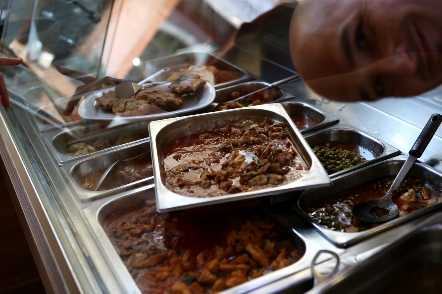 Traditional Bosnian dishes ready for serving, showcasing a variety of local culinary delights