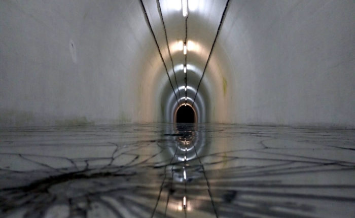 Interior view of Tito's bunker in Bosnia, showcasing the tunnel structure during a Sarajevo Insider tour