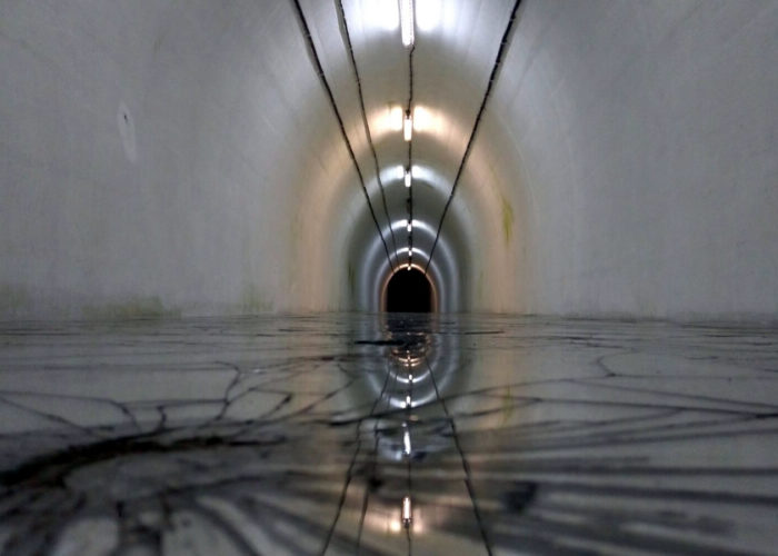 Interior view of Tito's bunker in Bosnia, showcasing the tunnel structure during a Sarajevo Insider tour
