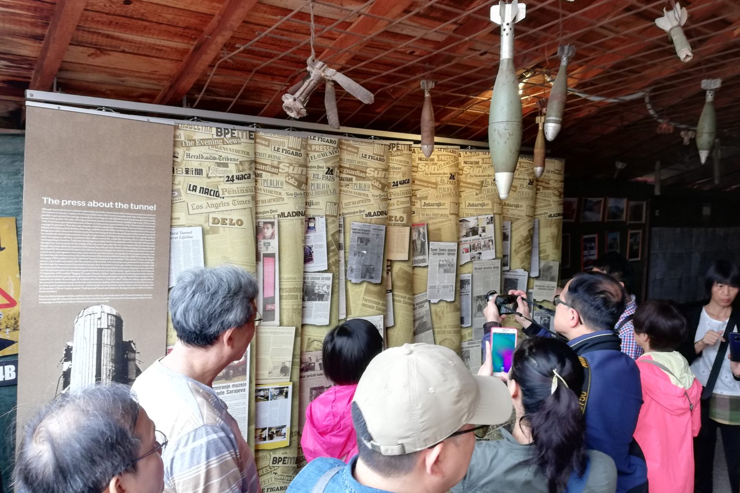 Tourists entering the Tunnel of Hope in Sarajevo during a guided tour by Sarajevo Insider