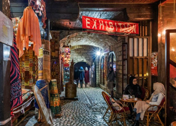 Entrance to Morića Han in Sarajevo with traditional crafts and a cozy café
